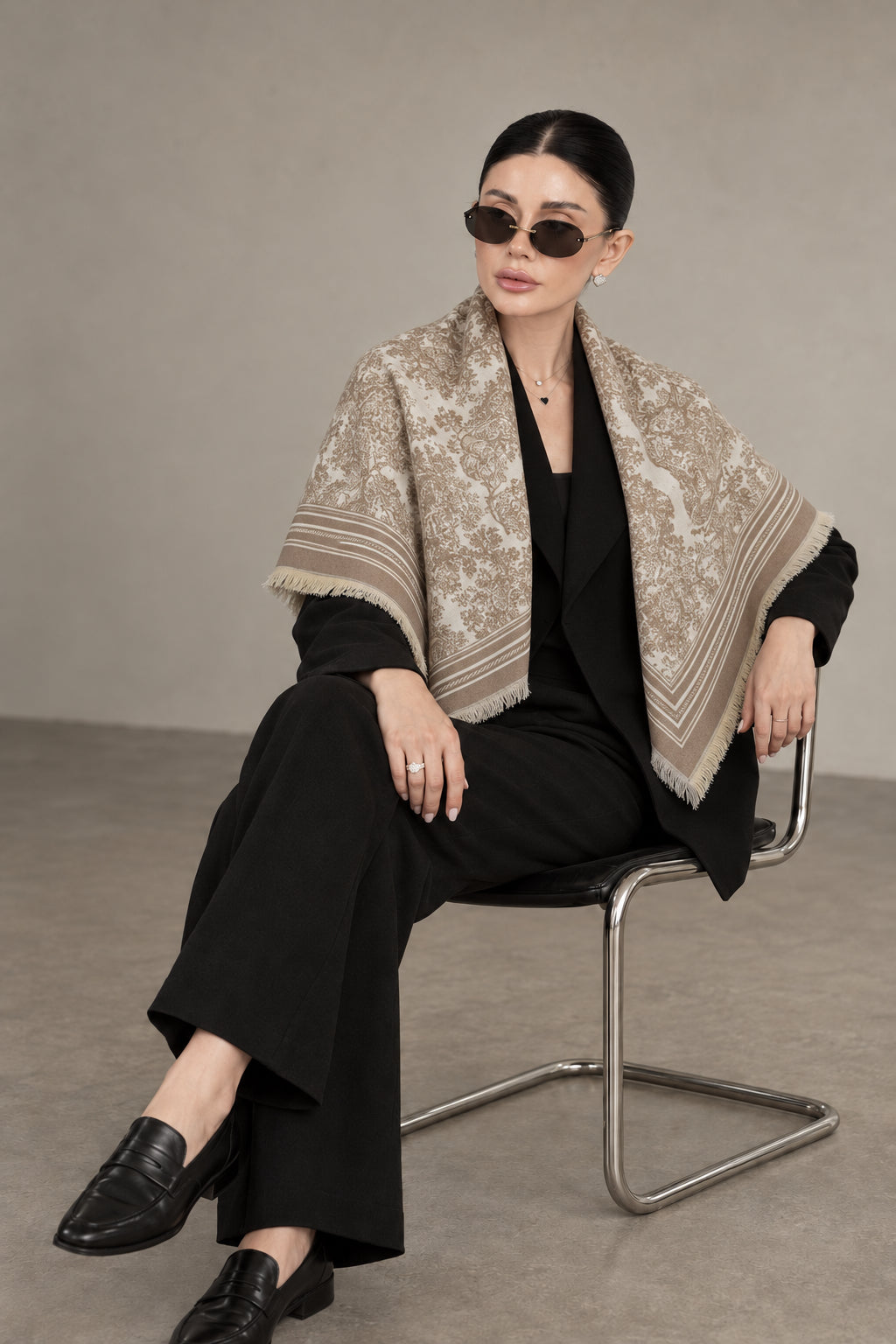 BEIGE cashmere animal print square shawl folded into a triangle — seated