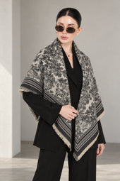 BLACK cashmere animal print square shawl folded into a triangle — standing