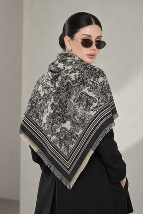 BLACK cashmere animal print square shawl folded into a triangle — triangle-back