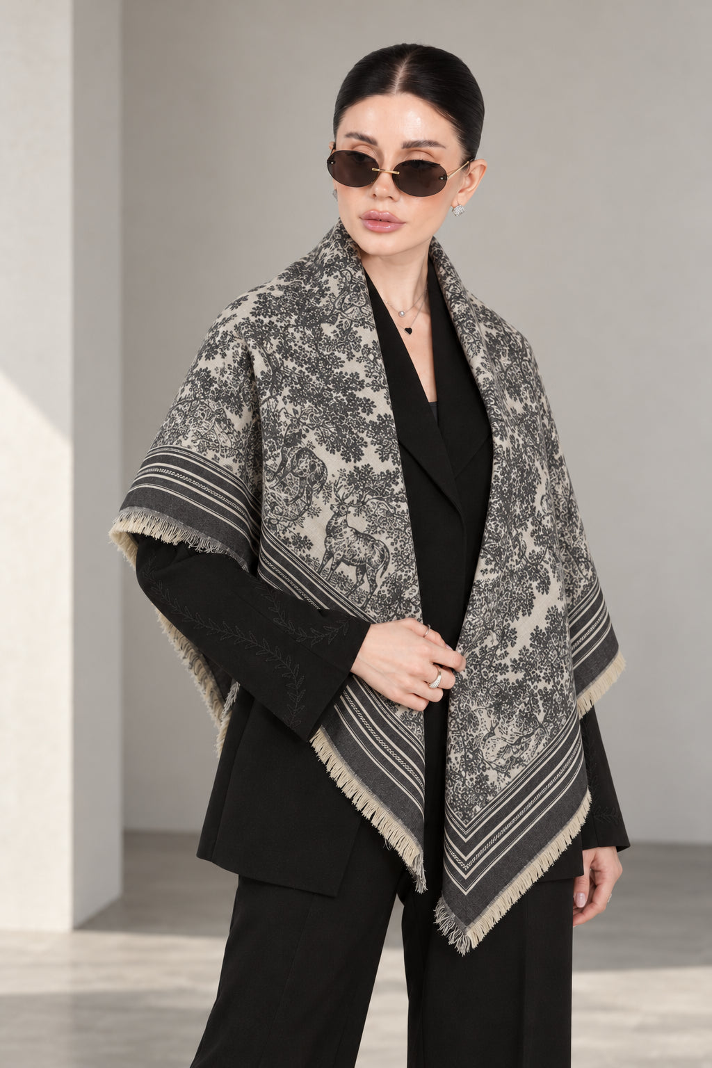 GREY cashmere animal print square shawl folded into a triangle — standing