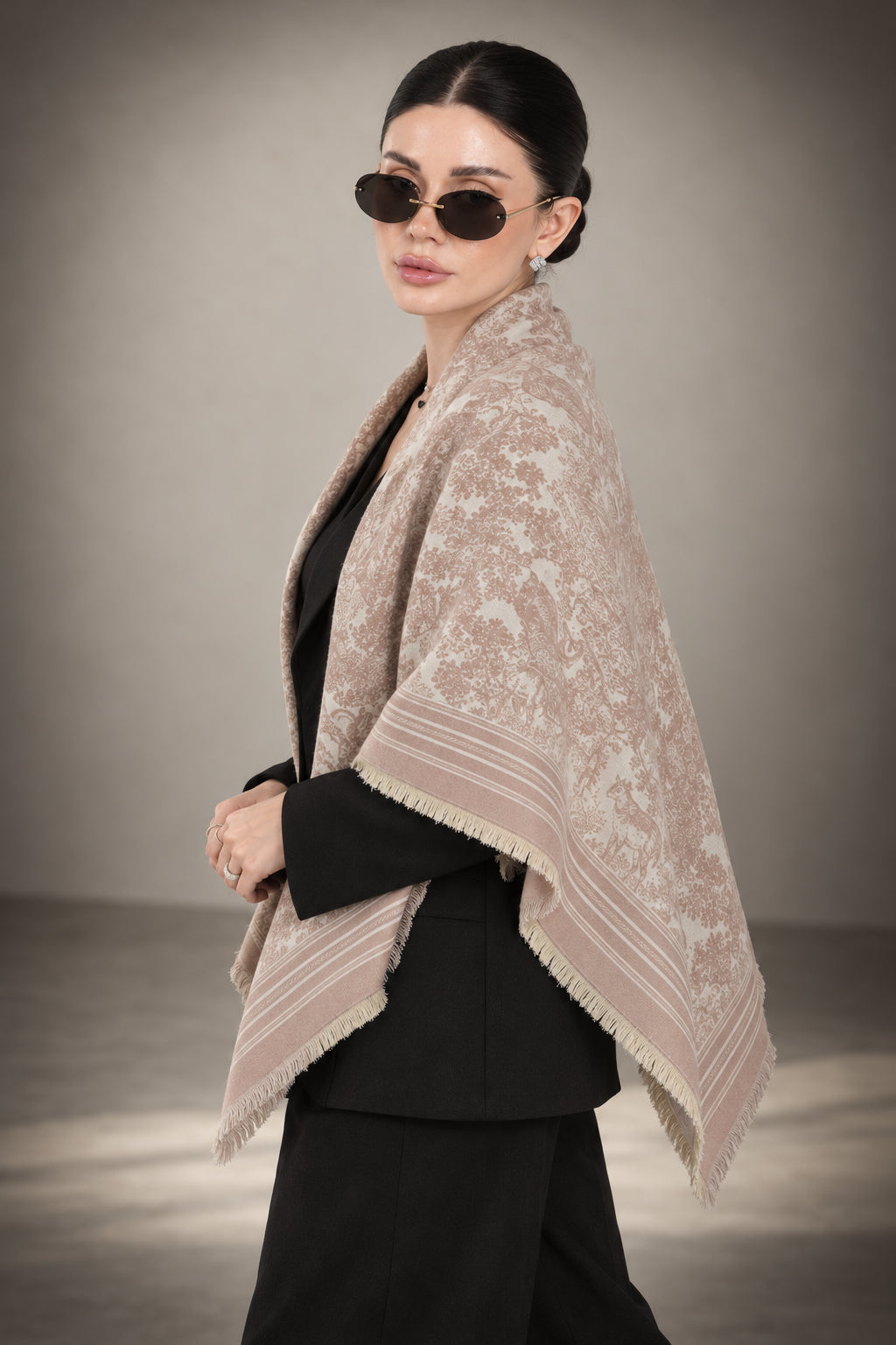 LIGHT PINK GULABI cashmere animal print square shawl folded into a triangle — vignette