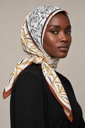 Silk Golden Lily Murabba Scarf, 90×90 cm square hijab in Kuwait — closeup portrait