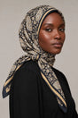 Silk Golden Paisley Murabba Scarf, 90×90 cm square hijab in Kuwait — closeup portrait